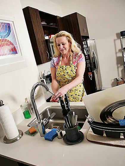 Blonde busty milf kitchen