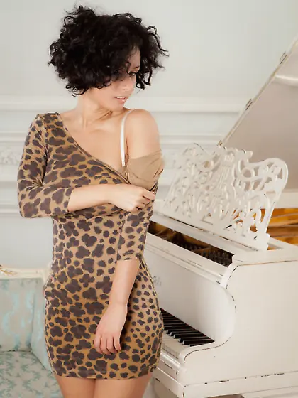 Short-haired and curly teen takes off her leopard print dress Vi