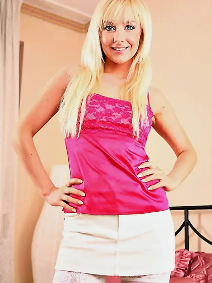 Foxy blonde gal Lucy Nova strips her mini skirt and teases us in