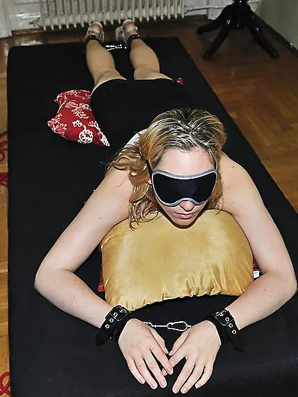 Stunning filly blindfolded shackled