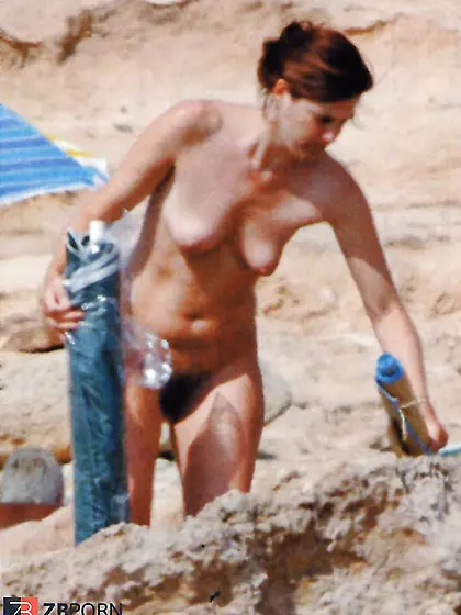 Sveva Sagramola (italian journalist) bare on the beach