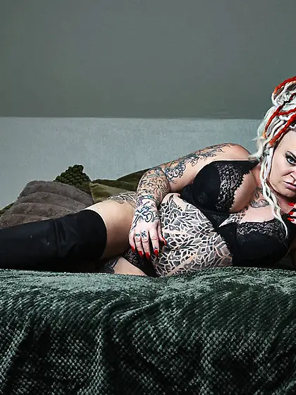 Mistress Domina Dark and her sub slave Miss Reed in bed