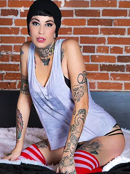 Short haired tattooed angel