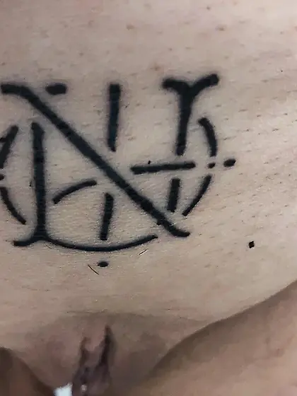 Huendin permanently marked with tattoo