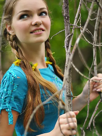 Exciting and excitable teenage girl takes off her oversized pant