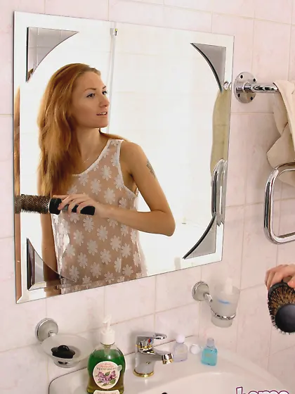 Red whore with a wet cunt is going to fuck a dildo today