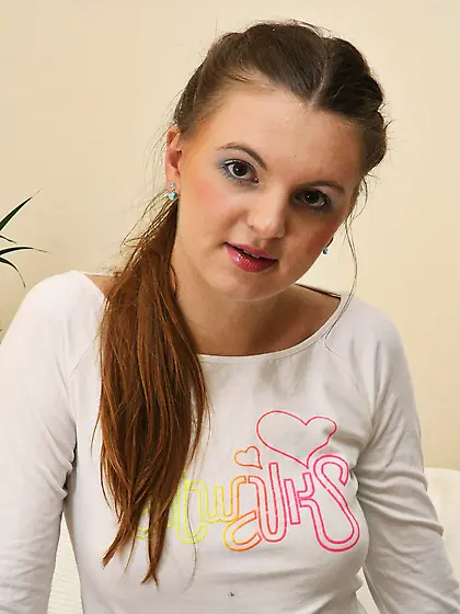 Young girl in colourful socks spreads her pink pussy open with h