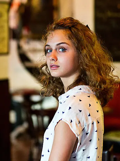 Wavy-haired and pale-skinned brunette exposing her pussy outdoor