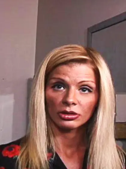 Gorgeous blonde woman tied