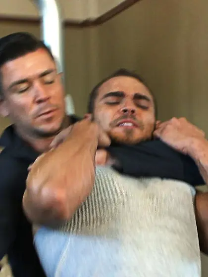 Angry muscular dude gagged