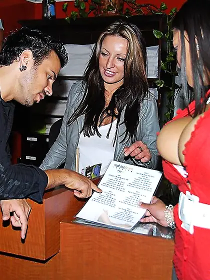 Big titted dark Lady Spyce dressed in red gives massage and then