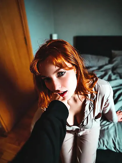 Redhead daughter in pajamas with daddy