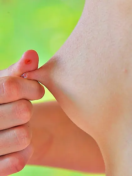 Ponytailed beauty in high heels shows her tiny tits and masturba