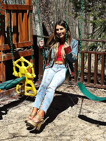 Gorgeous nymph with big jugs flashes her shaved snatch outdoors