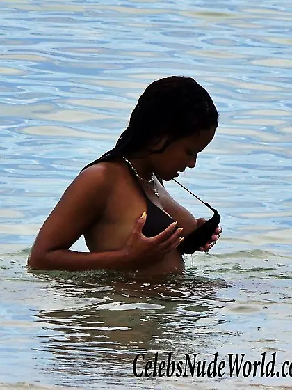 Christina Milian Nip Slip While Adjusting Bikini Top In Miami