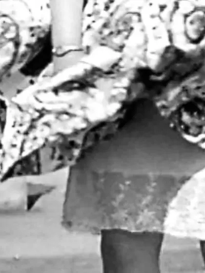 Looking up her micro-skirt