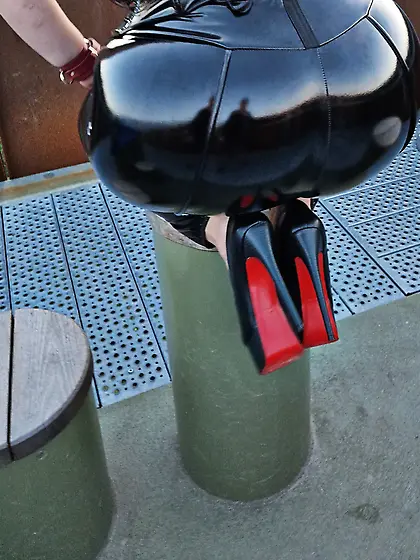 MissBigButt visits an overlook wearing her shiny dress