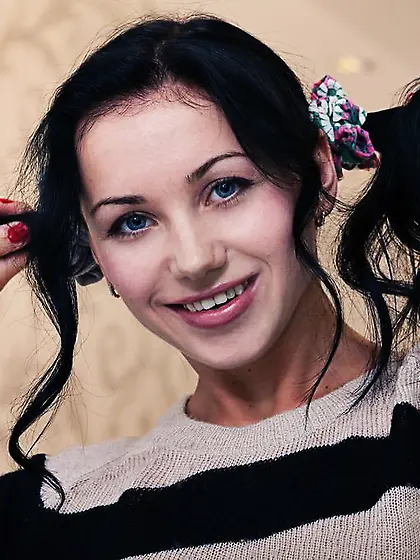 Brunette with pigtails presents her unbelievably tight body for