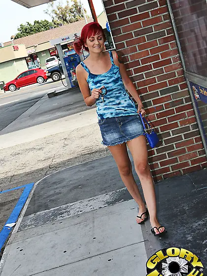 Playful redhead with pierced nipples gets analyzed in the bathro