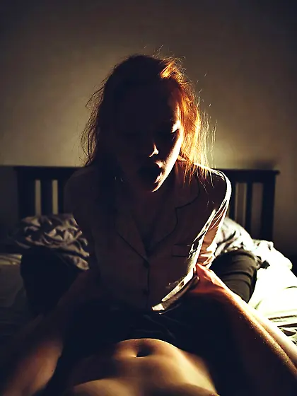Redhead daughter in pajamas with daddy