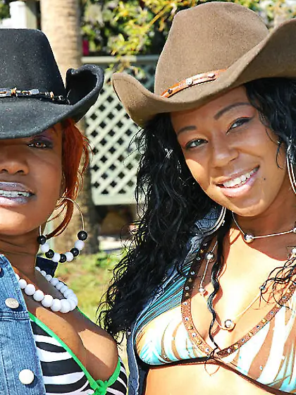 Ebony beauties with oiled-up booties and assless chaps get fucke