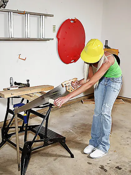 Blonde babe with a hard hat gets nude and inserts tools in tiny