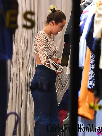 Miley Cyrus Flashes Tits In A Fishnet Top While Shopping In SoHo