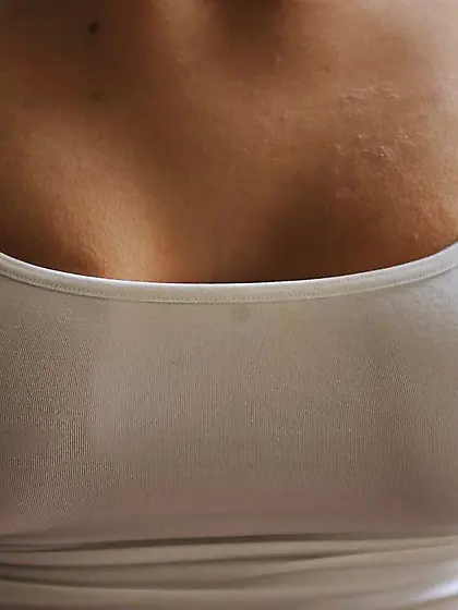 Delicate-looking brunette guides a large toy in her oozing pussy