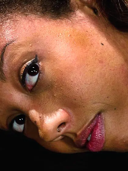 Ball-gagged black girl straitjacket