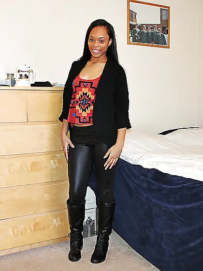 Black babe with a hot bod wears leather pants and looks sublime