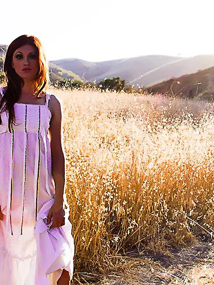 The redhead teen Virginia Mae is alone in the field naked enjoyi