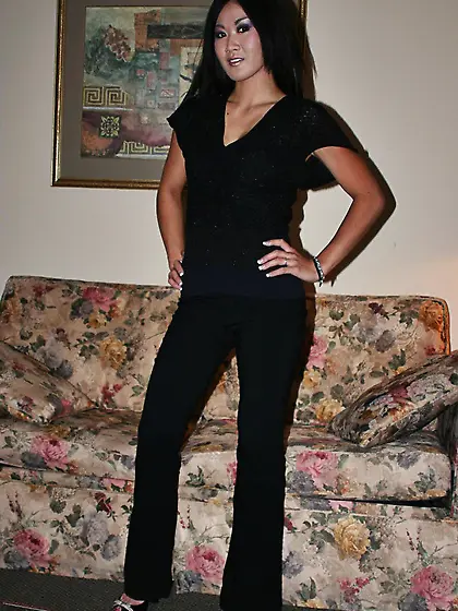 Raven haired asian Taya Talise gets nude and gently spreads her