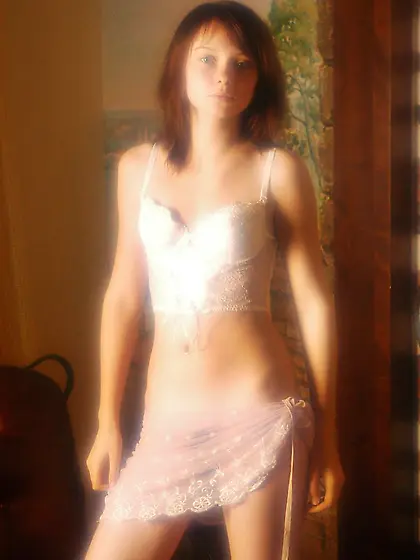 Brunette super-stunner showing her appealing physique in a hot g