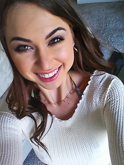 Cute-looking brunette in a colorful bikini face-fucked in POV