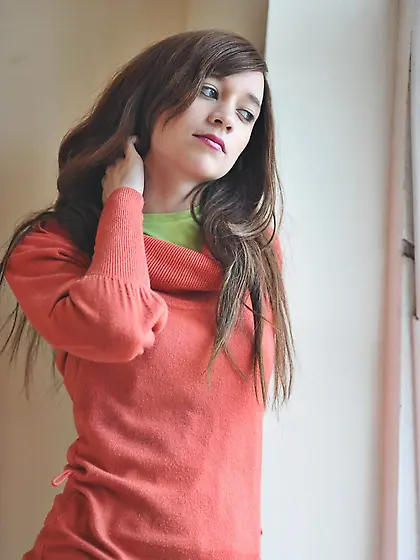 Simone takes off her blue jeans in a non-nude action