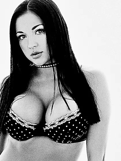 Mega breasted brunette Audrey Bitoni takes off her bra and revea