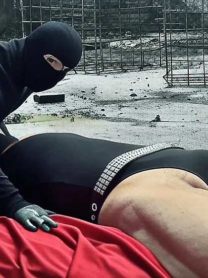 Black Superhero captured in netting.  KO and fondle