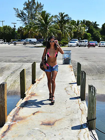 Round butt Latina takes off her bikini and gets fucked on a boat