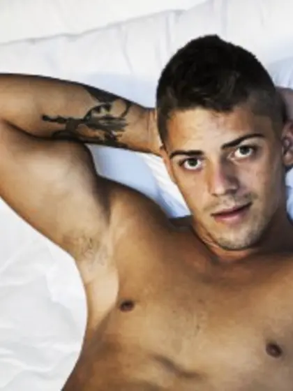 Brunette Young Man Levyst Smoking.