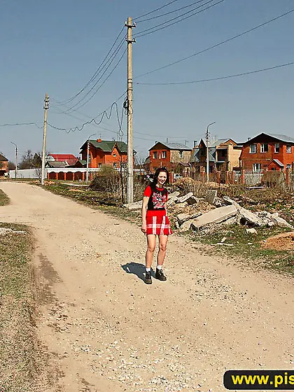 Pissing outdoor in a village street