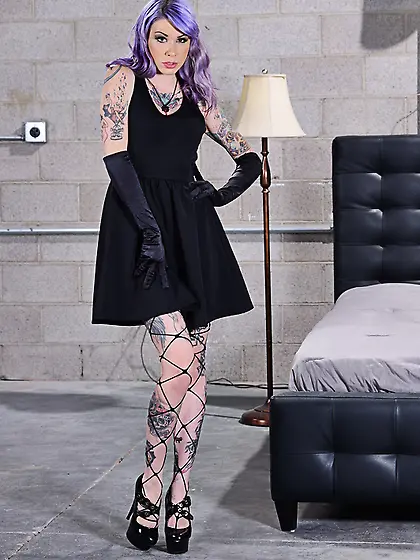 Purple-haired spinner pierced tongue