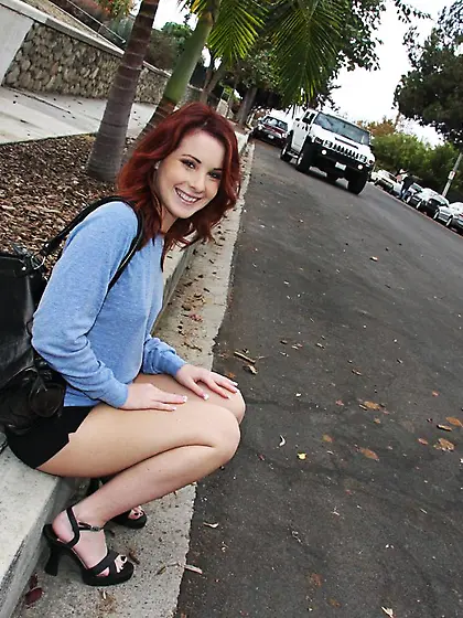 Redhead chick Tweetie Valentine is naughtily playing with the bi