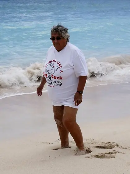 Mature babe posing beach