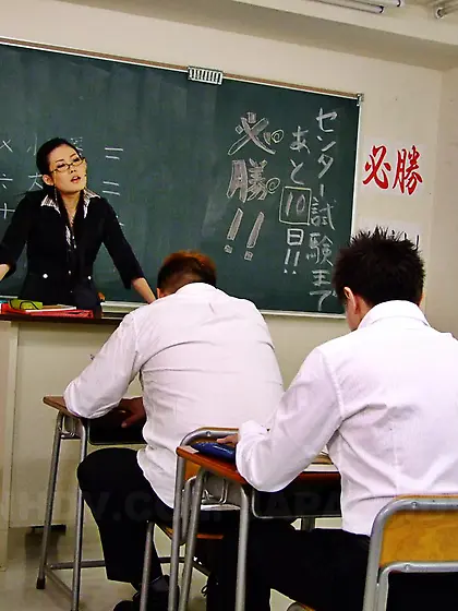 Kinky teacher in uniform Yui Komine is doing blowjob over studen