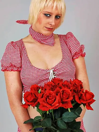 Photo shoot with blonde cum slut Dany Sun in a Bavarian dres