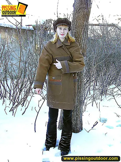 Winter outdoor pissing of girl naked under coat