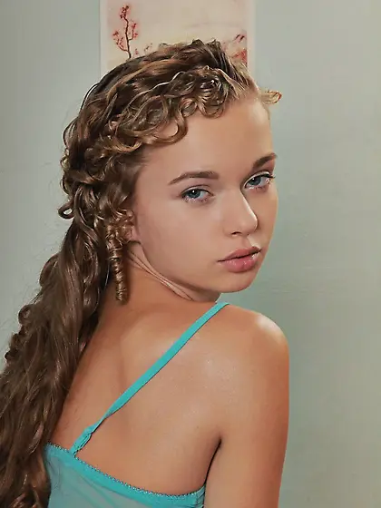 Milena D takes her sexy lingerie on the bed and shows us her hai