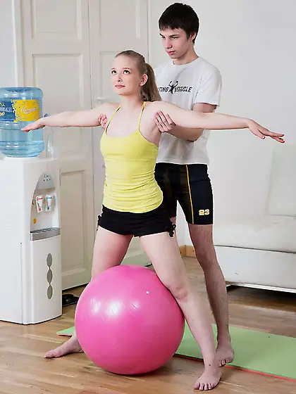 Young blonde girl seduced and fucked by yoga instructor on fitba