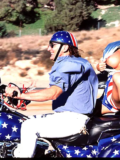 Big breasted brunette Rocki Roads strips outdoors and shows her