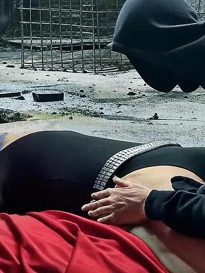 Black Superhero captured in netting.  KO and fondle